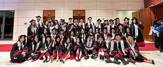 [My class graduation photo from my Bachelor of Laws program]